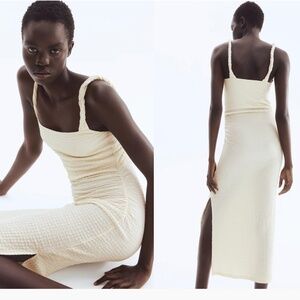 Textured jersey midi dress. Beige. Size M. New without tag